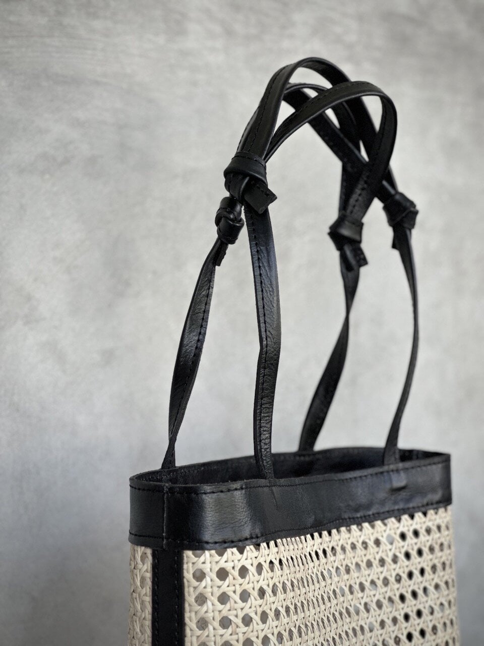 MANHATTAN black leather & rattan bag