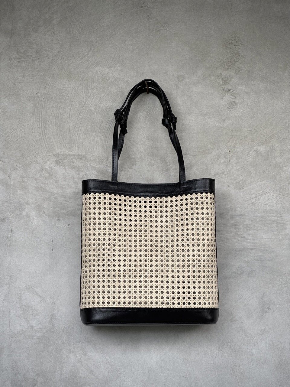 MANHATTAN black leather & rattan bag