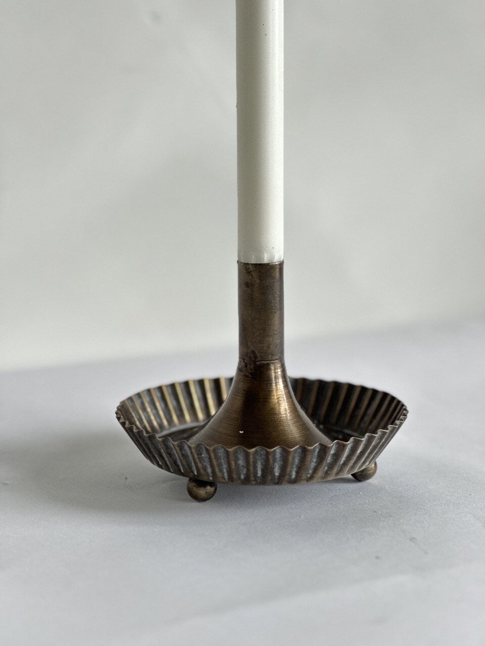 AGON table candle holder, antique brass